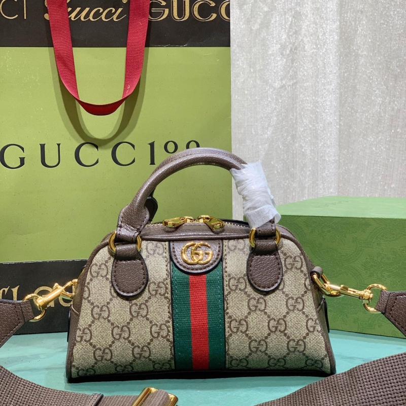 G*u*i top handle bags